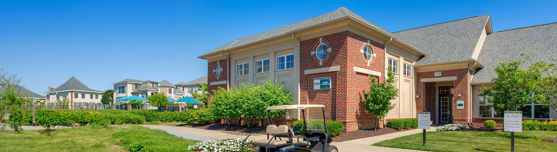The exterior of the leasing office at District at Saxony Apartments